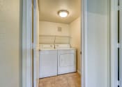 Thumbnail 18 of 25 - the washer and dryer in the laundry room of a home
