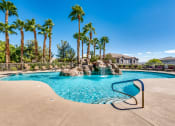 Thumbnail 14 of 30 - our resort style swimming pool is surrounded by palm trees