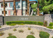 Thumbnail 16 of 30 - a building with a sign that says in front of a retaining wall