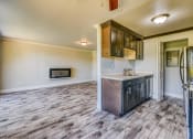 Thumbnail 6 of 17 - the kitchen is open to the living room and has a stainless steel appliance