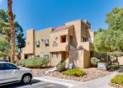 Thumbnail 9 of 32 - a car parked in front of a building at Pacific Harbors Sunrise Apartments, Las Vegas, Nevada