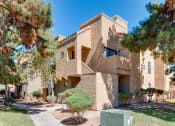 Thumbnail 10 of 32 - a building with a staircase and trees in front of it at Pacific Harbors Sunrise Apartments, Nevada