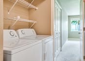 Thumbnail 11 of 17 - Laundry at Village at The Pointe Apartments, Tacoma, WA
