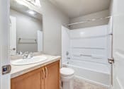 Thumbnail 10 of 17 - Bathroom with vanity and tub at Village at The Pointe Apartments, Tacoma, WA,98407