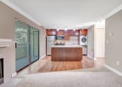 Thumbnail 11 of 21 - Living Room & Kitchen at Whispering Brook Apartments, Des Moines, WA,98198