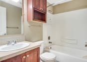 Thumbnail 14 of 21 - Bathroom Side Angle at Whispering Brook Apartments, Washington