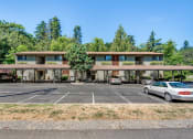 Thumbnail 19 of 21 - Parking Lot Front at Whispering Brook Apartments, Des Moines, WA,98198