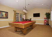 Thumbnail 12 of 39 - Game Room Including Pool Table at Sky Court Harbors at The Lakes Apartments, Las Vegas, NV