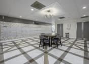 Thumbnail 19 of 23 - a conference room with a table and chairs in the center of it