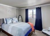 Thumbnail 24 of 34 - the view of a bedroom with a bed and a window at 2000 Lake Washington Apartments, Renton, 98056
