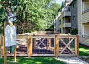 Thumbnail 26 of 34 - Pet Park with wooden fenced in boundaries at 2000 Lake Washington Apartments, Renton, 98056