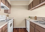 Thumbnail 16 of 33 - Galley Kitchen at Chevy Chase in Austin, TX