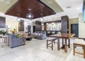 Thumbnail 38 of 56 - a lobby with couches chairs and a table at One Plantation in Plantation, Florida 33324