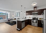 Thumbnail 1 of 46 - Open Concept Kitchen and Living Room at The Parker Apartments in Portland, OR 97209