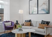 Thumbnail 7 of 46 - Living Room Couch at The Parker Apartments in Portland, OR 97209