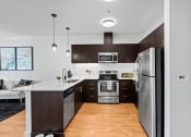 Thumbnail 2 of 46 - Kitchen at The Parker Apartments in Portland, OR 97209