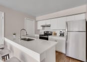 Thumbnail 2 of 32 - Breakfast bar at Arcadia Apartment Homes in Centennial, CO