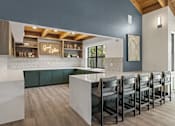 Thumbnail 19 of 29 - Community Lounge Kitchen at The Lakes Apartments in Bellevue, WA 98007