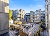 Thumbnail 2 of 27 - Outdoor Patio Area at 128 on State Apartments in Kirkland, WA 98033