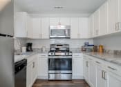 Thumbnail 2 of 27 - Modern Kitchen at The Residences at Stevens Pond in Saugus, MA 01906
