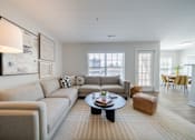 Thumbnail 5 of 27 - Spacious Living Room at The Residences at Stevens Pond in Saugus, MA 01906