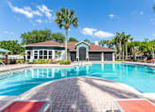 Thumbnail 16 of 38 - Resort-Style Swimming Pool at Country Club Lakes Apartments in Jacksonville, FL 32224
