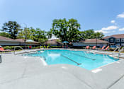 Thumbnail 17 of 38 - Resort-Style Swimming Pool at Country Club Lakes Apartments in Jacksonville, FL 32224