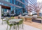 Thumbnail 31 of 41 - Outdoor Grilling Area at 903 Peachtree Apartments in Atlanta, GA 30309