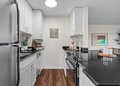 Thumbnail 6 of 30 - Modern Kitchen at Skye Apartments in Seattle, WA 98121