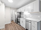 Thumbnail 10 of 30 - Modern Kitchen at Skye Apartments in Seattle, WA 98121