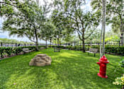 Thumbnail 35 of 37 - Onsite Dog Park and Play Area at One Plantation Apartments in Plantation, FL 33324
