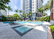 Thumbnail 17 of 37 - Resort Style Pool and Hot Tub at One Plantation Apartments in Plantation, FL 33324