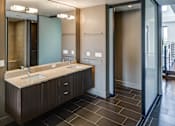 Thumbnail 15 of 55 - Bathroom with a Double Sink at Misora Apartments, San Jose, CA