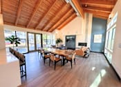 Thumbnail 26 of 30 - A dining room with a wooden table and chairs at The Lakes in Bellevue, Washington 98007