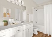 Thumbnail 11 of 29 - a white bathroom with a shower and a sink and a toilet at Veranda at Centerfield in Houston, TX