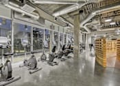 Thumbnail 38 of 43 - a gym with treadmills and other exercise equipment at L Seven, San Francisco, CA