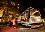 Thumbnail 43 of 43 - a trolley car on the street at night at L Seven, CA 94103