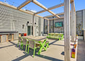 Thumbnail 27 of 43 - the patio of the house has a table and chairs at L Seven, CA 94103