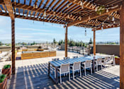 Thumbnail 33 of 55 - Wooden patio at Misora Apartments, California