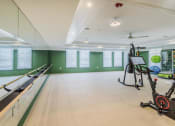 Thumbnail 31 of 39 - Spacious yoga and barre studio with spin bikes at The Merchant Apartments, South Carolina