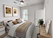 Thumbnail 11 of 39 - a bedroom with a bed at The Merchant Apartments, Charleston, SC