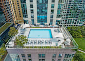 Thumbnail 57 of 57 - an aerial view of a pool on the roof of a building at Shoreham and Tides Apartments, Chicago, IL