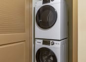 Thumbnail 15 of 28 - stacked in- unit washer and dryer at 128 on State, Kirkland