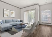 Thumbnail 13 of 40 - a living room with a couch and chairs and a window at Aston at Cinco Ranch, Katy, TX, 77450