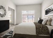 Thumbnail 9 of 40 - a bedroom with a large bed and a window at Aston at Cinco Ranch, Katy, TX, 77450