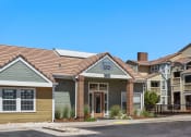 Thumbnail 31 of 32 - a building with a street in front of it at Arcadia Apartments, Centennial, 80112