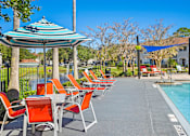 Thumbnail 21 of 38 - Poolside Dining Tables at Country Club Lakes, Jacksonville, FL, 32224