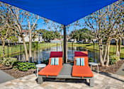 Thumbnail 19 of 38 - Relaxing Lounge Chairs at Country Club Lakes, Jacksonville, Florida