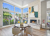 Thumbnail 30 of 38 - Living Area With Fireplace at Country Club Lakes, Florida