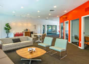 Thumbnail 11 of 17 - a living room with couches and chairs and a table at Skyview Apartments, Westminster, 80234